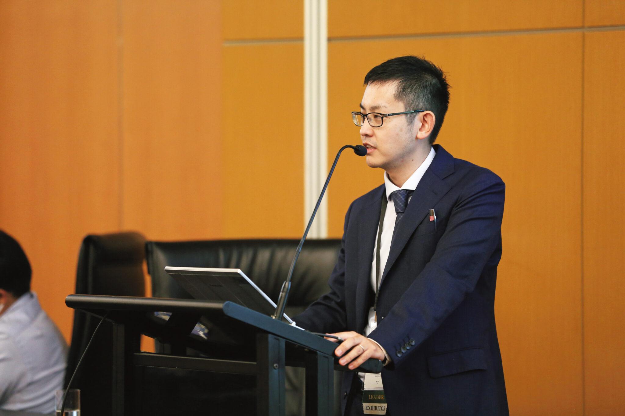 Mr. Nogami making a presentation
