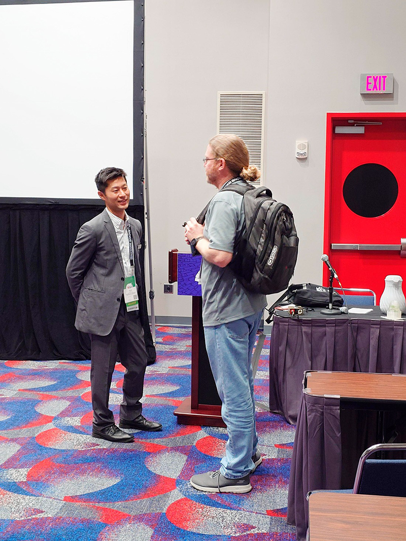 Masuda taking questions from an audience member