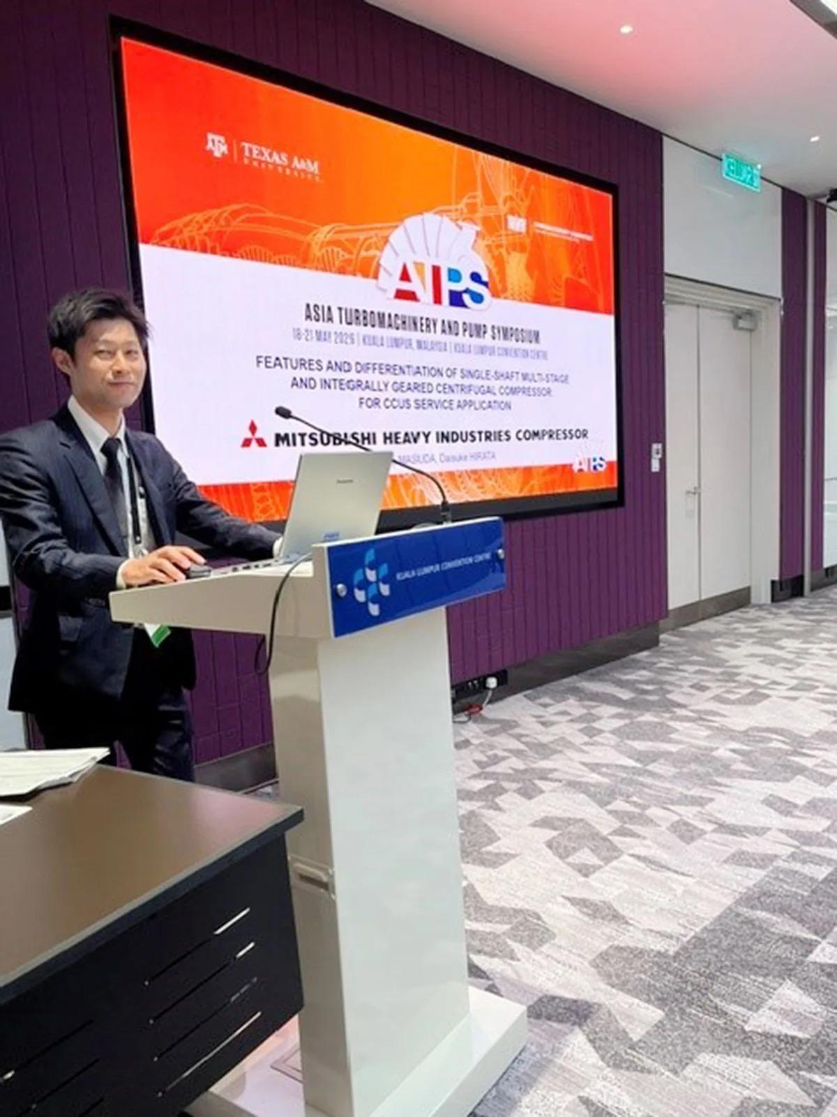 Masuda preparing for his presentation