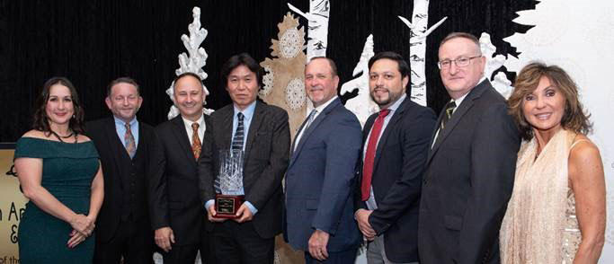 From left to right: Donna Connelly – Pearland chairman, Mark Smith – Pearland Chairman Elect, Lawrence Rominger – VP QHSE, Manabu Saga – President, Jerry Jones – Procurement Manager, Guillermo Suarez – NUB Project Manager, Joseph Lee – Facilities Manager, Carol Artz-Bucek – President and CEO of Pearland Chamber of Commerce