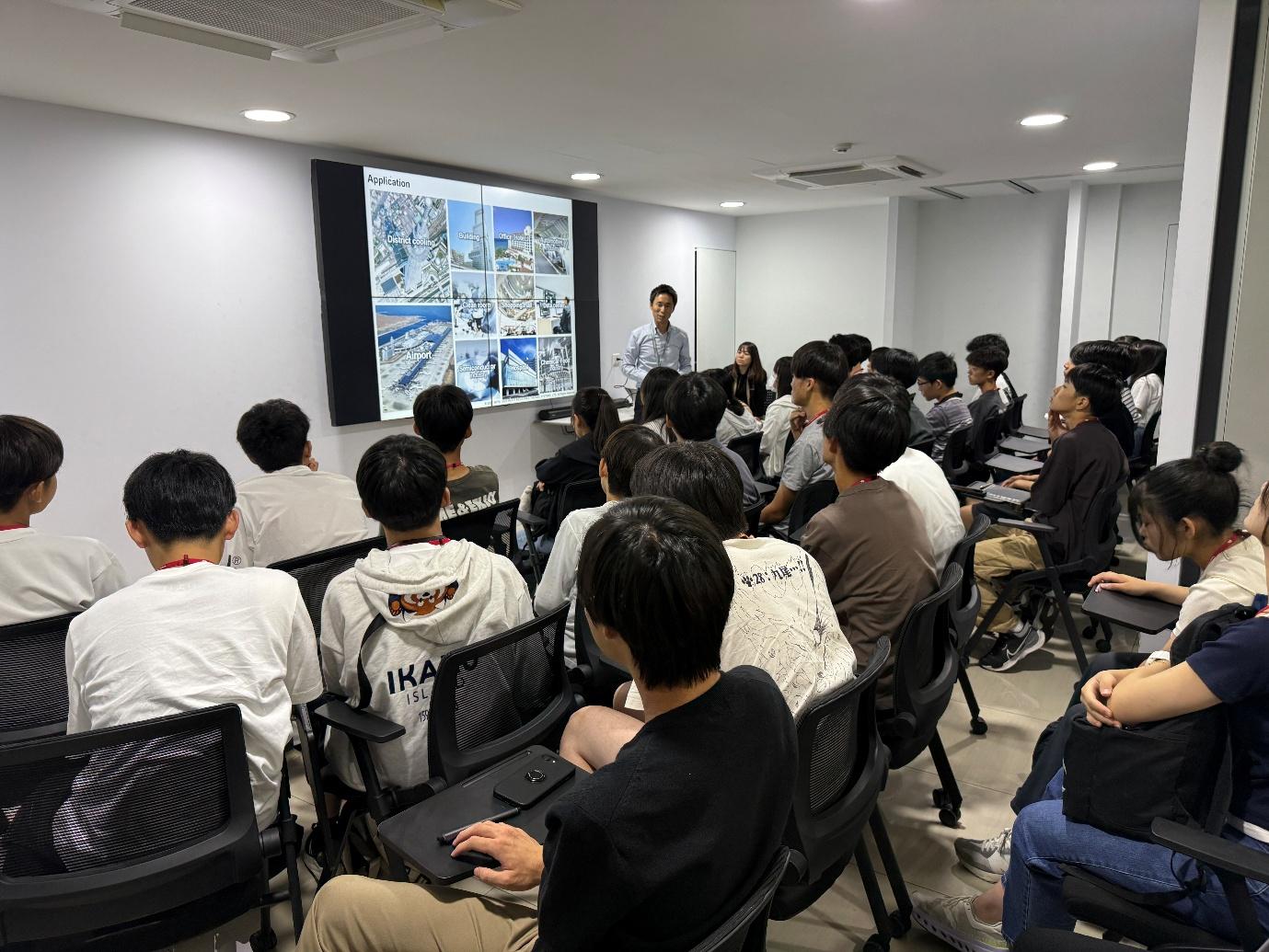 Japanese high school students attending an MHI-ESA business and product presentation