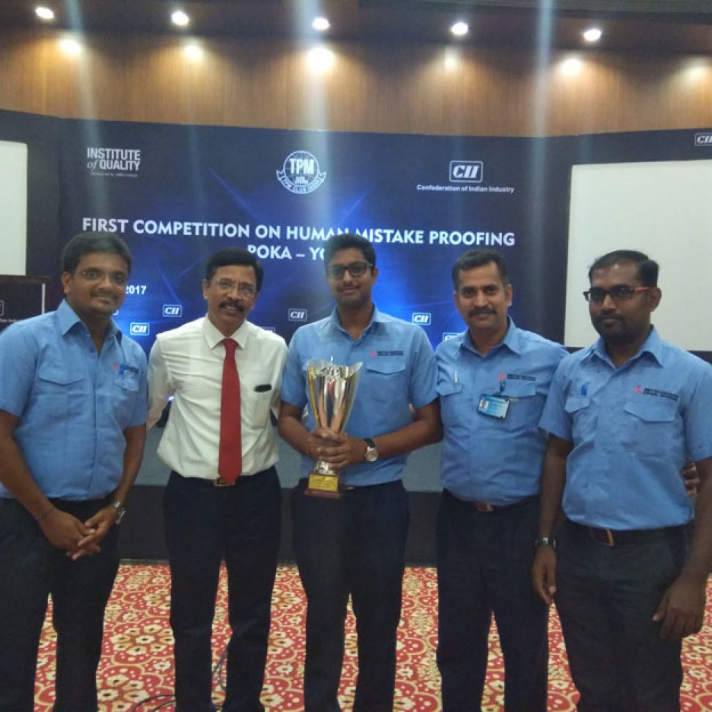 MVDE team with trophy