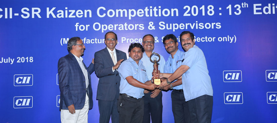 MVDE team receiving Kaizen competition award