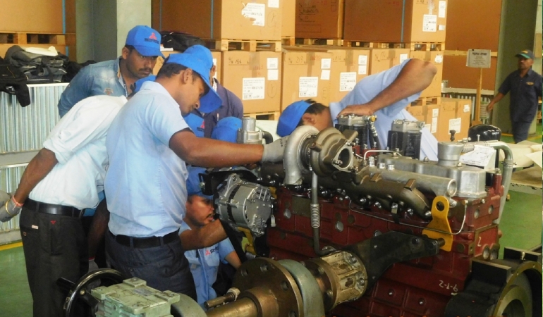 MVDE team examining the engine parts