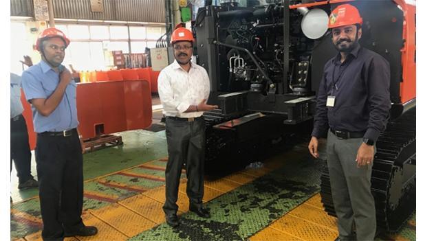 MVDE India workers working on a mini excavator diesel engine used in construction machinery and Dewatering pump