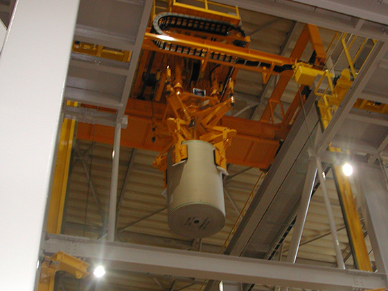重力式ロール紙自動吊具