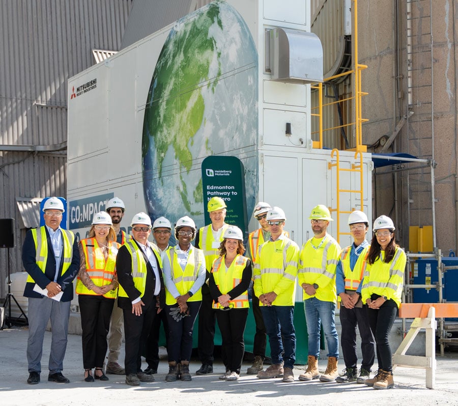 With Alberta Environment Minister in front of MHI's newly installed carbon capture system at Heidelberg Materials' cement plant in Canada, Aug. 15, 2023 
(photo courtesy of Heidelberg Materials.)