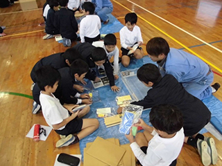 Each group collaborated in making a pop-pop boat.