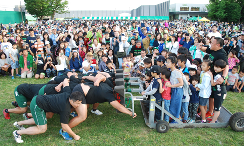 Scrumming against the local children