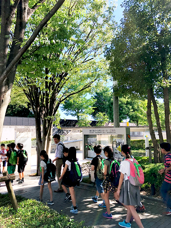 Students heading toward the theater