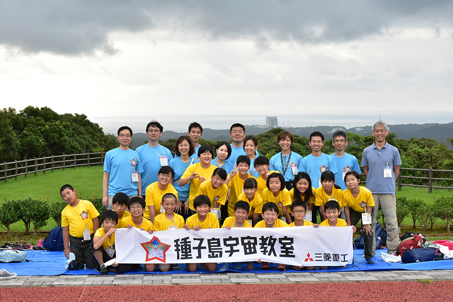 This year's participants, with the Space Center launchpad in the background