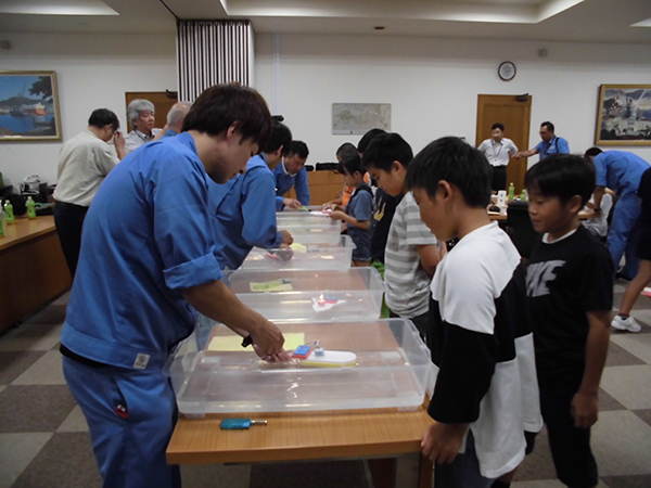 Testing the pop-pop boats in water