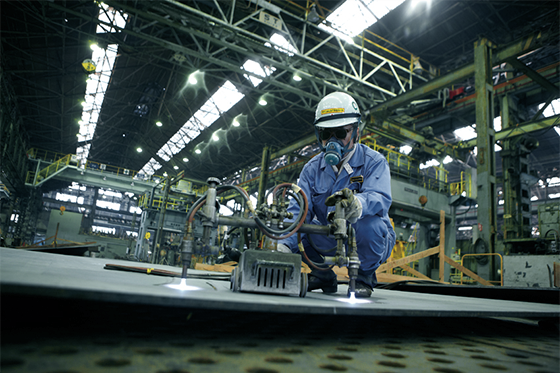 The hull's outer plates are molded into the shape specified by the design drawings using burners (to cause expansion) and water cooling (to induce shrinkage).