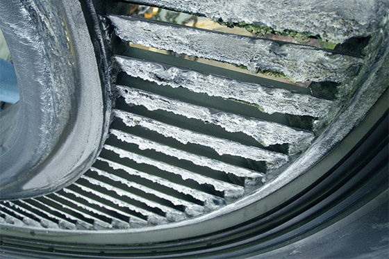 Photo:Scale formation on first-stage nozzle, nearest the turbine inlet.
