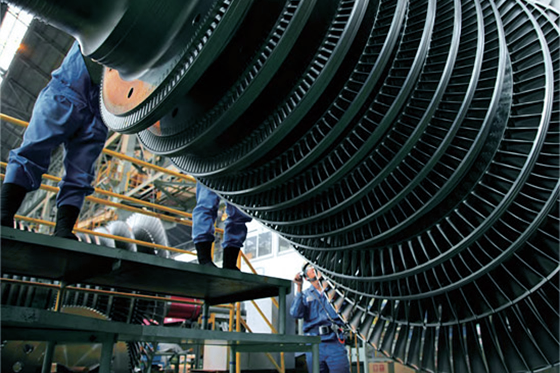 Photo:Following a series of trials and examinations, a steam turbine undergoes its the final inspection before shipment.