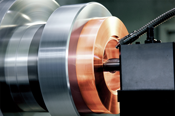 Photo:An ultra-precise lathe is used to put the finishing touches on cell components (washers) that make up a normal conducting accelerating structure.