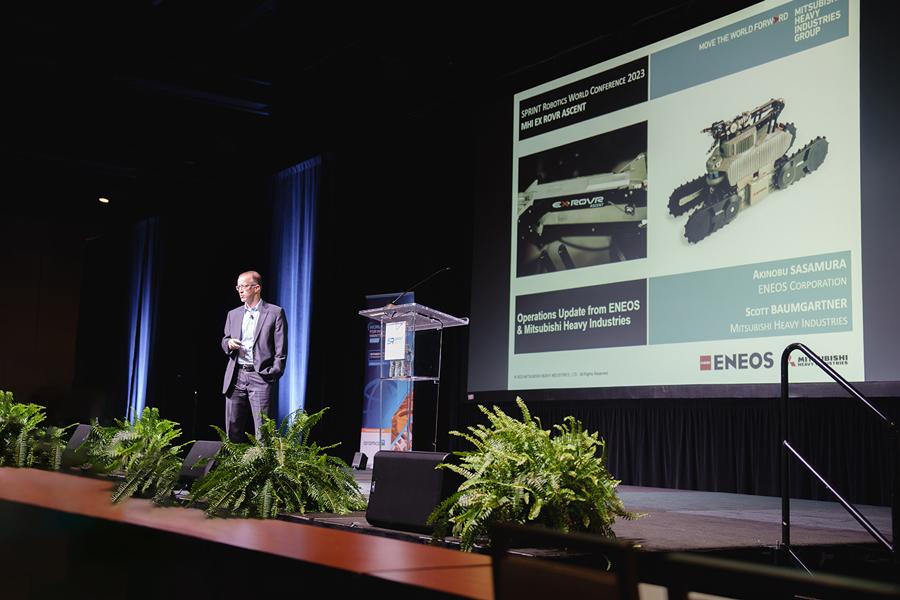 Presentations by MHI (left) and ENEOS (right) at SPRINT Robotics World Conference