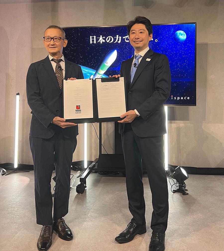 An image of Iwao Igarashi, Vice President & Senior General Manager, MHI and Takeshi Hakamada, Founder & CEO of ispace at a signing ceremony held at ispace headquarters in Tokyo, Japan.