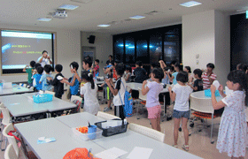 [Children enjoying "Cosmic College 2013"]